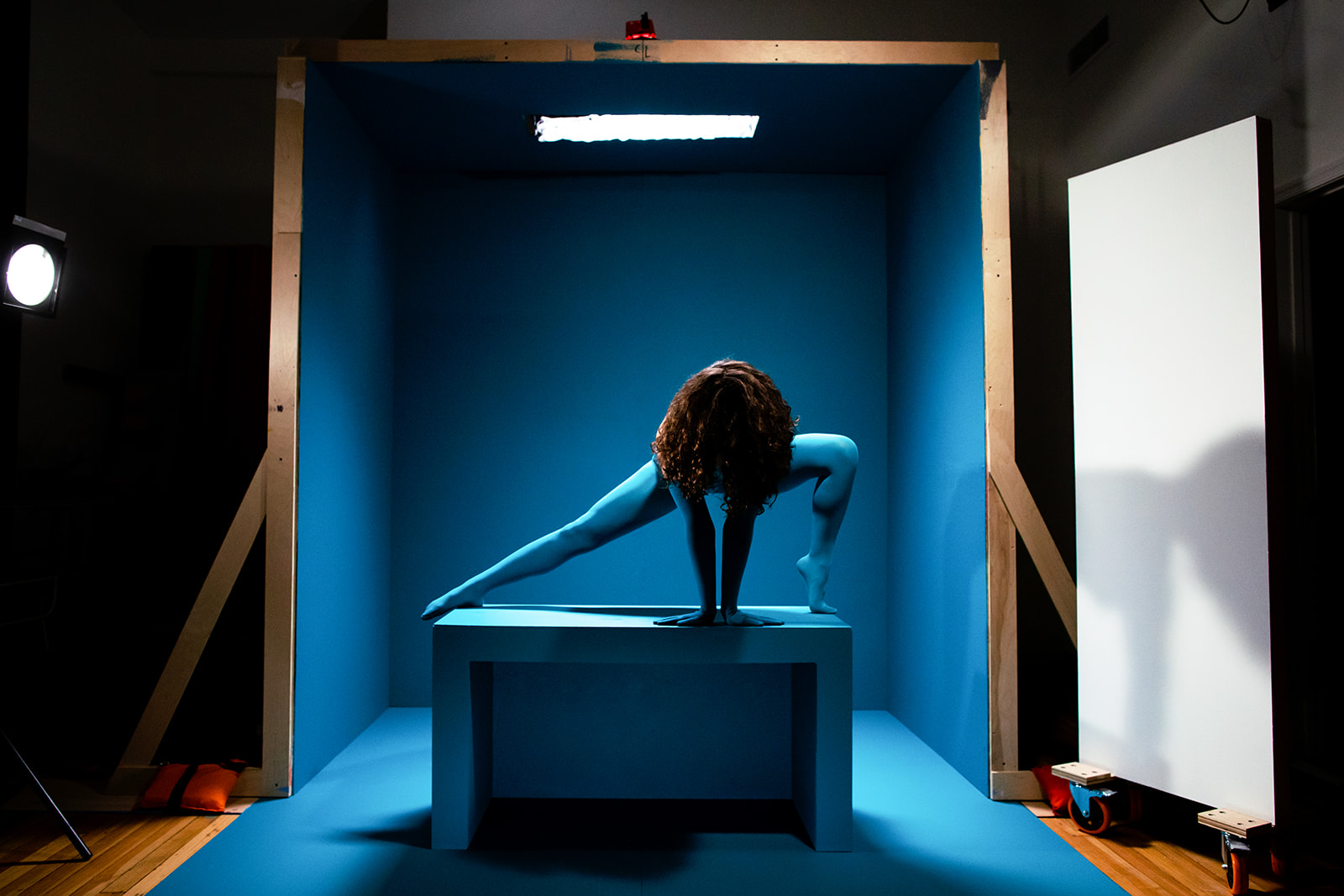 Teal Tights Body Sculptures in a Teal Cube Conceptual Photos - Image Property of www.j-dphoto.com